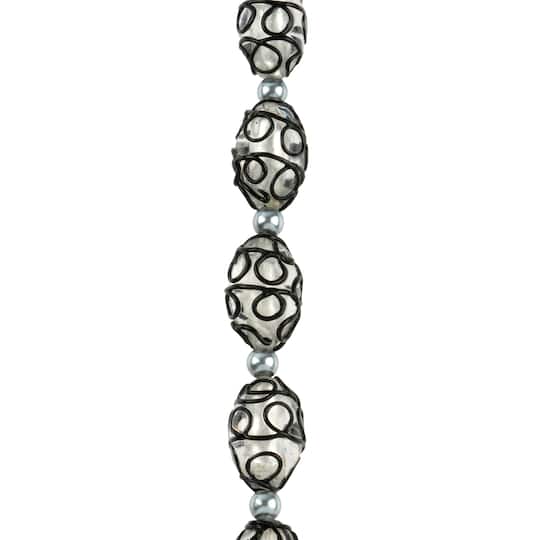 12 Packs: 7 ct. (84 total) Black Lines Lampwork Glass Oval Bead Mix by Bead Landing™